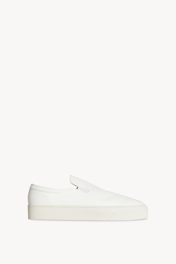 The Row white slip-on sneaker