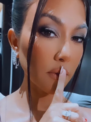 Fresh off her wedding to Travis Barker, Kourtney Kardashian showed off nude nails with hidden red ti...