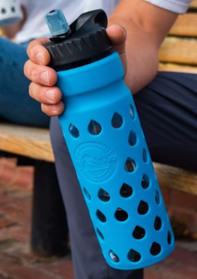 The Epic Escape is a filtered water bottle made from durable borosilicate glass with a protective si...