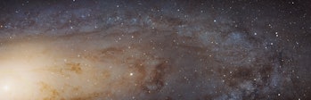 A 61,000-light-year-long section of the Andromeda galaxy. The left lower corner is filled with a lar...