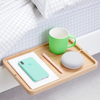 The BedShelfie clip-on nightstand is a great gift for college students