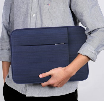 Man holding blue Lacdo laptop case, a great gift for new college students