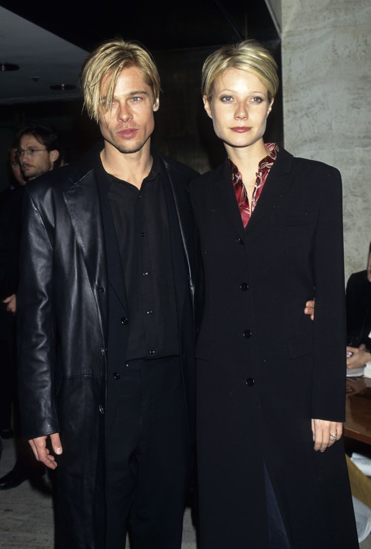 Brad Pitt and Gwyneth Paltrow matching in black ensembles and blonde pixie cuts