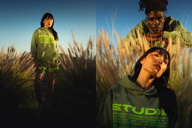 Supervsn Studios Models posing in green hoodies with fluroscent text on it.