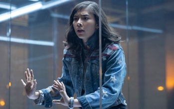 America Chavez (Xochitl Gomez) stands in a glass cell in Doctor Strange in the Multiverse of Madness