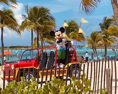 Taking a picture with Mickey Mouse is part of the Castaway Cay Leaderboard. 
