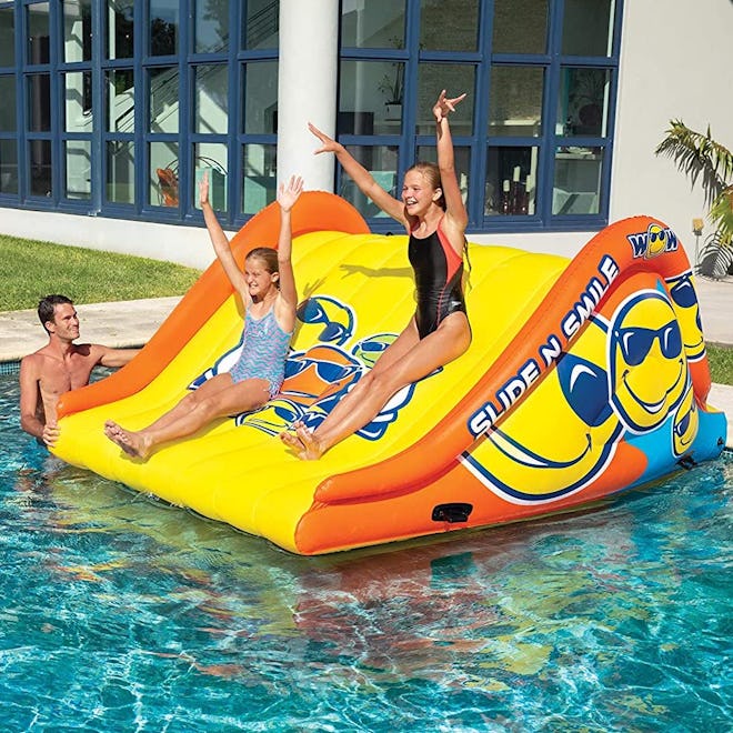 The WOW World of Watersport Pool Slide attaches to the side of a pool or dock. 