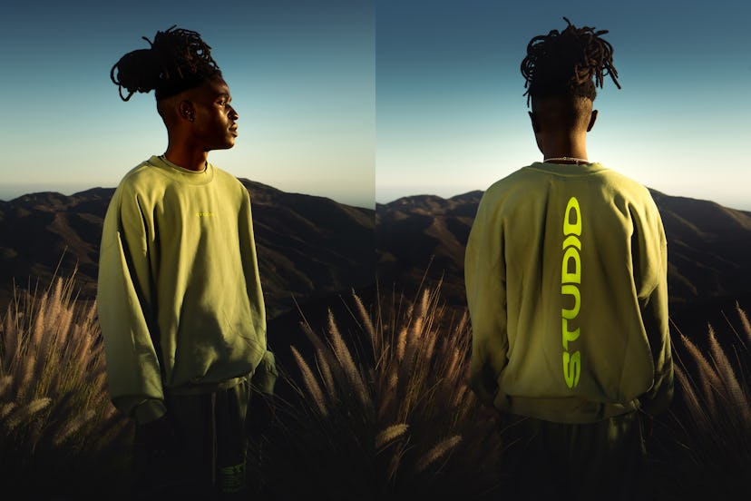 Supervsn Studios Model showing back and front side of yellow long sleeve shirt with fluroscent text ...