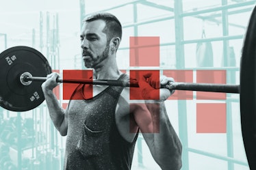 A man doing a shoulder exercise at a gym while using a barbell