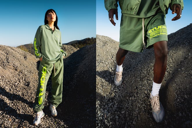 Supervsn Studios Green shorts, hoodie and trainer with fluroscent text.