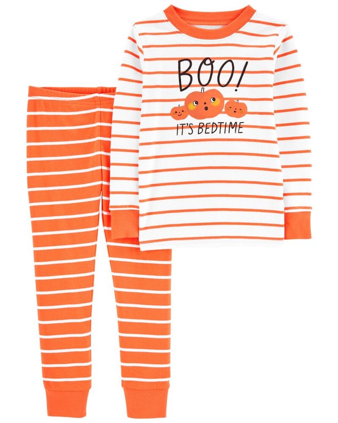 Halloween pajamas for kids 2022 feature pumpkins, skeletons, and more.