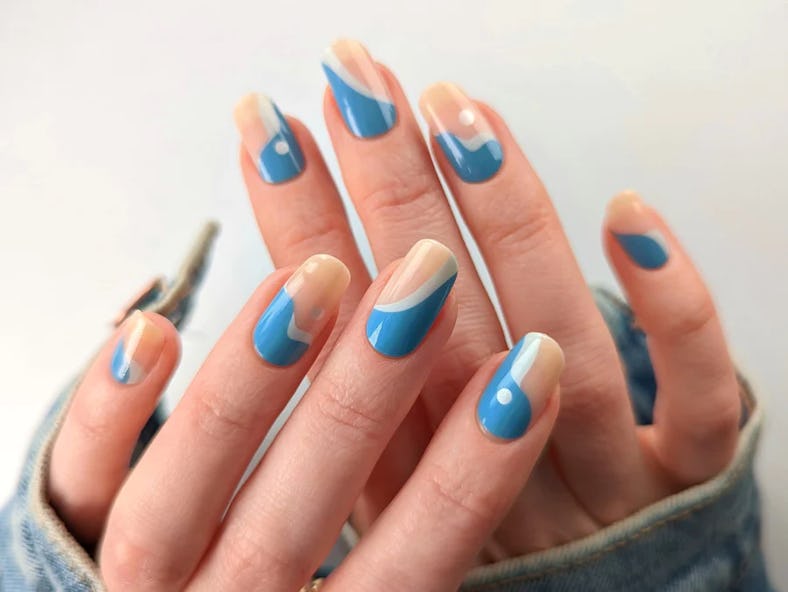 DIY swirl nails using ManiMe Co.'s blue waves nail wraps.