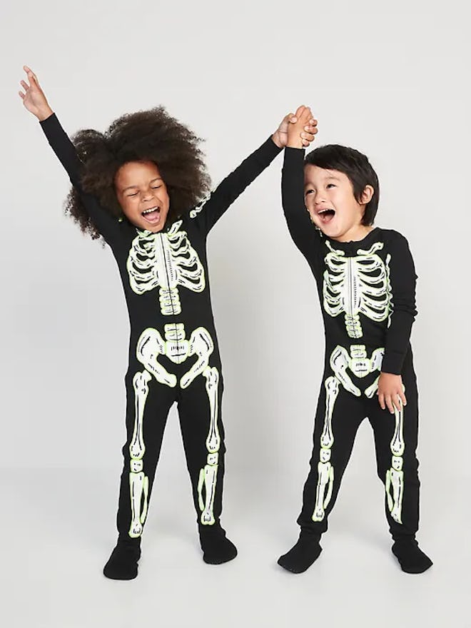 Skeleton Halloween pajamas for toddlers will delight them when they see themselves in a mirror.