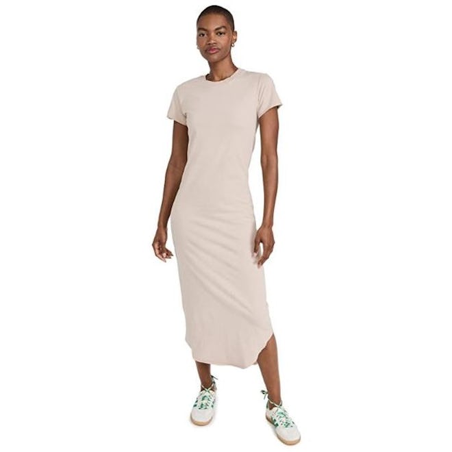 This maxi T-shirt dress is made of 100% cotton, and features a unique, curved raw hem