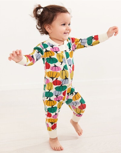 Halloween pajamas for kids aren't all orange and black; check out this multicolor pumpkin sleeper.