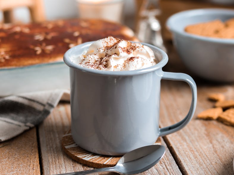 A cup of pumpkin spice latte — made for zodiac signs obsessed with PSLs.