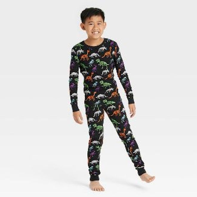 Dino skeleton pajamas are perfect for Halloween 2022.
