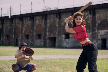 D'Arcy Carden as Greta practices her swing in A League of Their Own.