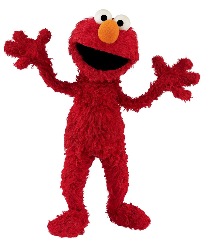 A photo of Elmo standing against a white background in an article about what kind of monster is Elmo...
