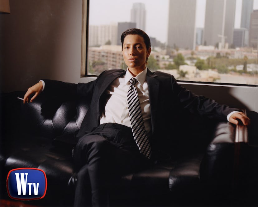 Jessica Biel as Don Draper from ‘Mad Men' in a black Armani suit and and grey striped Charvet tie.