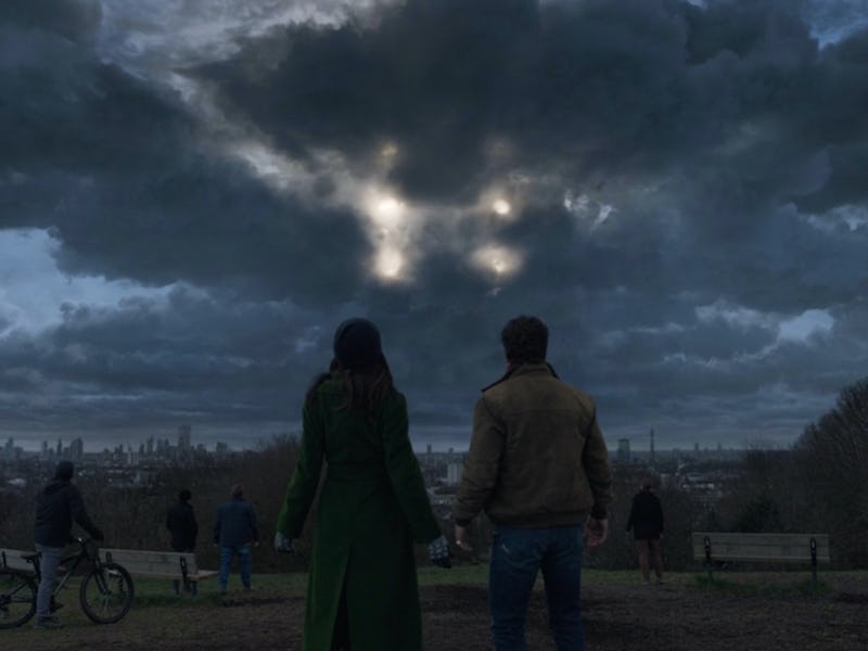 The Eternals staring at an Eternal emerging from a storm.