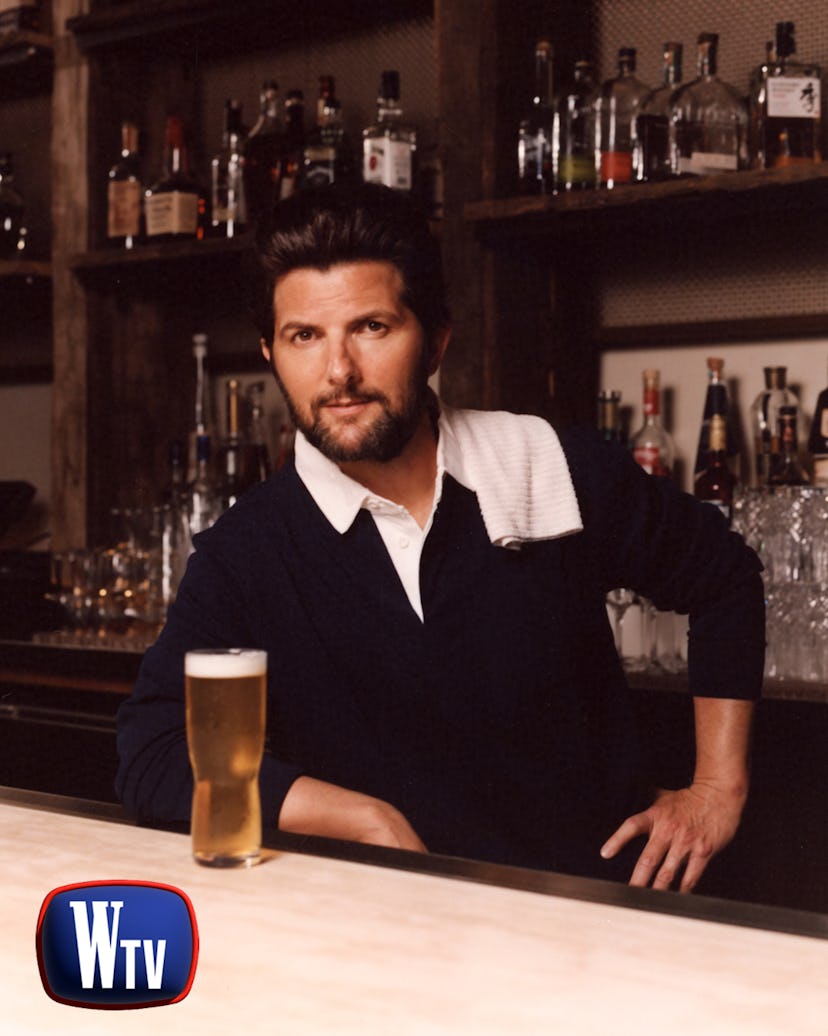 Adam Scott as Sam Malone in ‘Cheers.’ Scott wears Polo Ralph Lauren shirt.