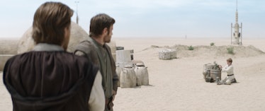Obi-Wan and Owen look over at Luke on Tatooine