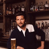 Adam Scott as Sam Malone in ‘Cheers.’  Scott wears Polo Ralph Lauren shirt.