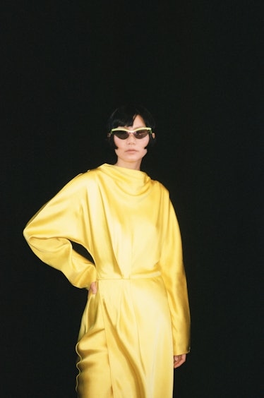 a model in yellow at the Stine Goya show