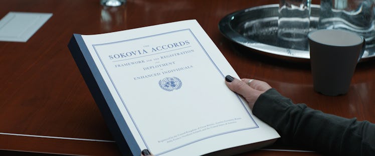Wanda Maximoff (Elizabeth Olsen) holds a copy of the Sokovia Accords in 2016’s Captain America: Civi...