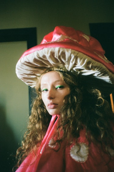 a model in  mushroom hat at the helmstedt show