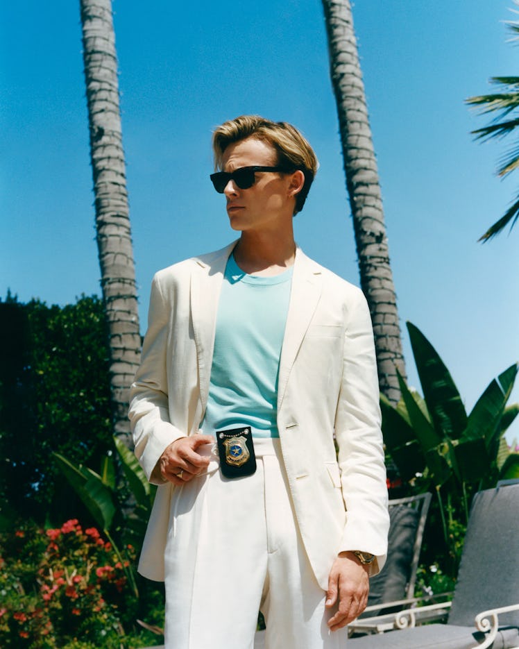 Anson Boon as James “Sonny” Crockett from ‘Miami Vice.’ Boon wears Ralph Lauren suit.