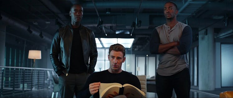 Steve Rogers (Chris Evans) holds open the Sokovia Accords in 2016's Captain America: Civil War