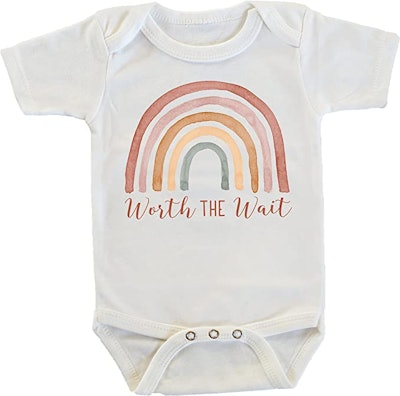 photo of rainbow onesie in an article about rainbow baby announcements