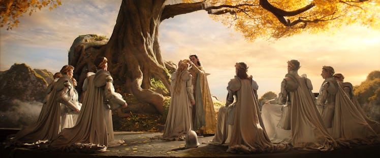 High King Gil-galad (Benjamin Walker) places a crown upon Galadriel’s (Morfydd Clark) head in The Lo...