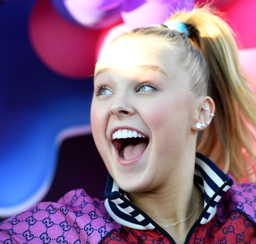 JoJo Siwa at the premiere of 'Siwa's Dance Pop Revolution' ahead of her getting a mullet.
