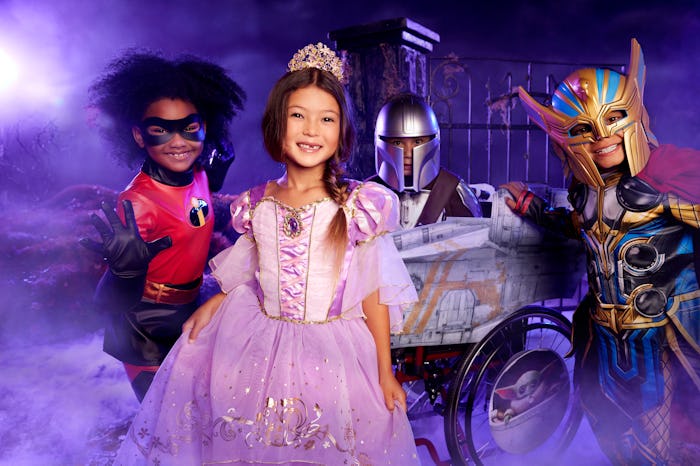 Kids dressed in Disney's 2022 Halloween costume lineup including a Mandalorian adaptive costume, an ...