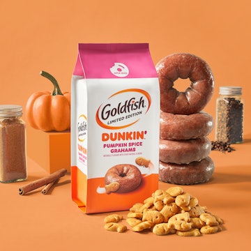 Dunkin' & Goldfish snack surrounded by cinnamon, pumpkin, and donuts 