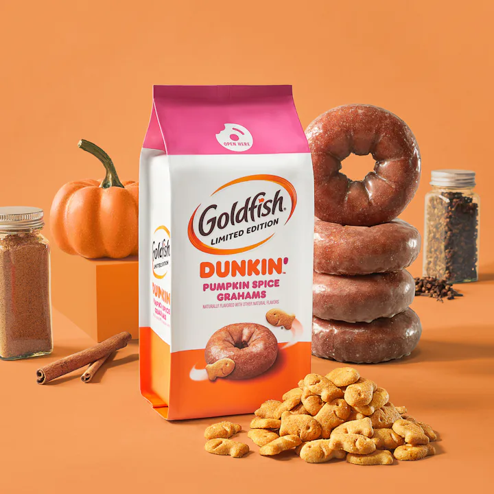 Dunkin' & Goldfish snack surrounded by cinnamon, pumpkin, and donuts