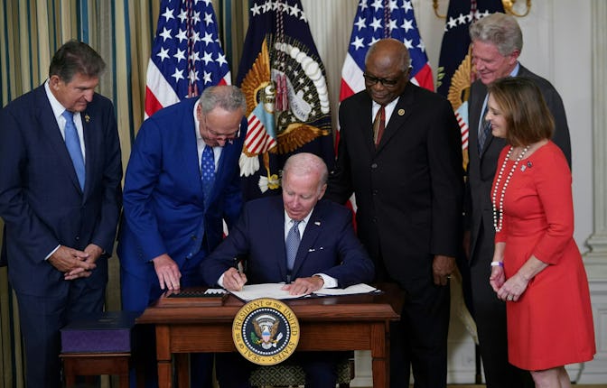 President Joe Biden signs the Inflation Reduction Act of 2022 into law during a ceremony in the Sta...