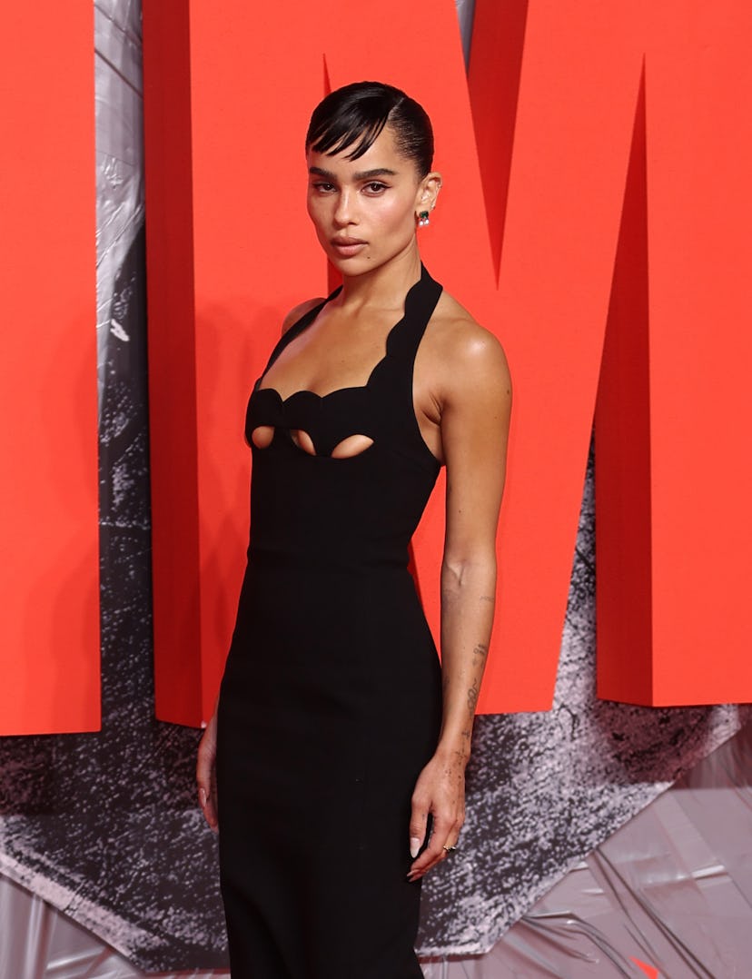 Zoë Kravitz wearing a black dress with cutouts