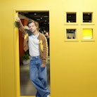 Harry Styles in a yellow house cutout, ahead of his 'Harry's Housewarming' Party in NYC, as part of ...
