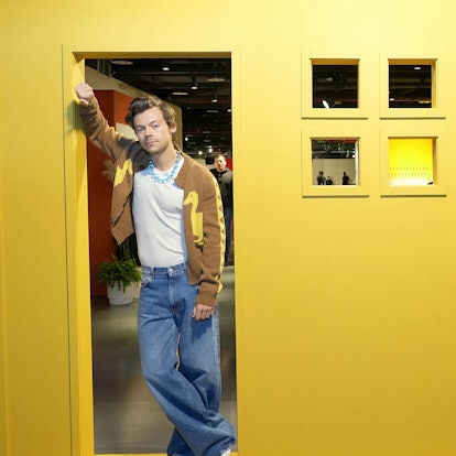 Harry Styles in a yellow house cutout, ahead of his 'Harry's Housewarming' Party in NYC, as part of ...