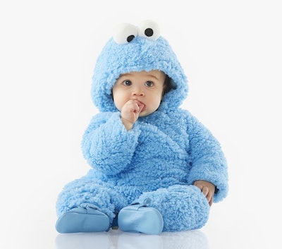 A white baby in a cookie monster halloween costume from pottery barn kids.