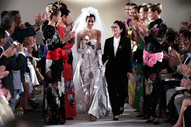 Izumi and Hanae Mori walk the runway of Hanae's final couture show in Paris in 2004