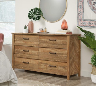 With a fancy herringbone feature, this Sauder Cannery Bridge Dresser is one of the best dressers for...