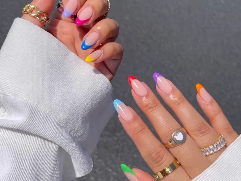 One of fall 2022's nail trends as seen on nail artist Michelle Khan the contrasting french manicure....