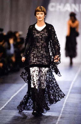 Evangelista walking the runway for Chanel in 1993. 