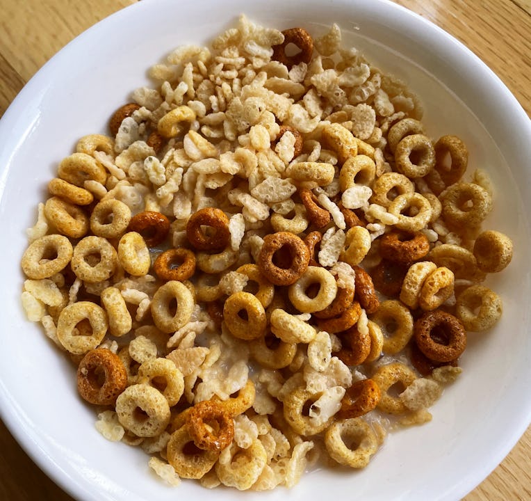Bowl of Cheerios, Rice Krispies, and milk.