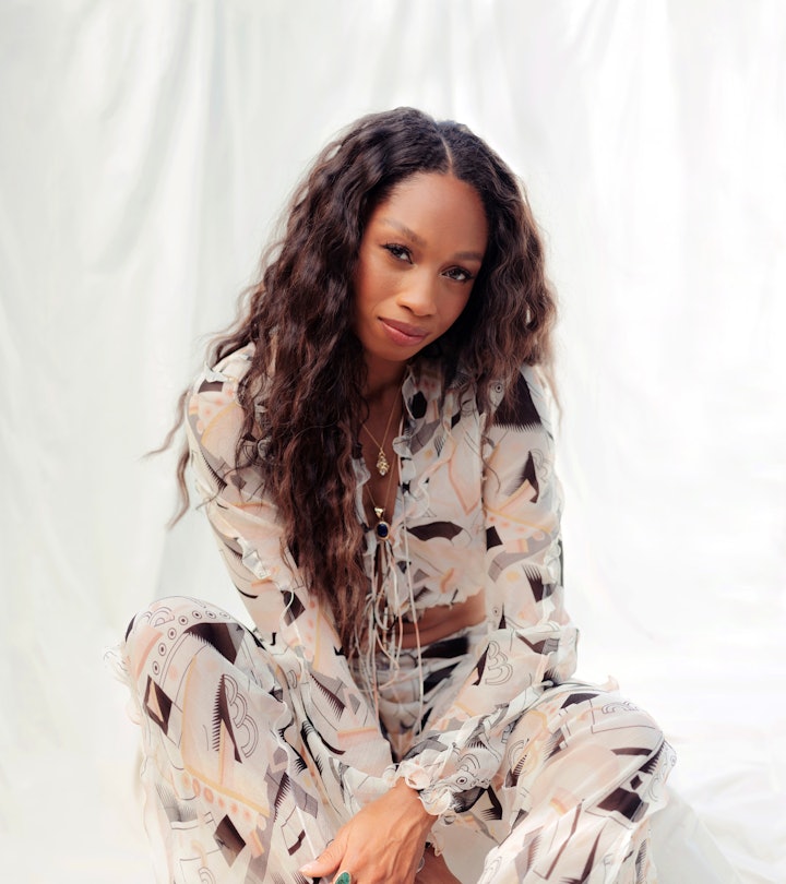 Allyson Felix chats with Romper in a video interview about motherhood. 
